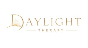 Daylight Therapy Logo. An illustrated sun is coming up over the horizon inside the "D" of the text. Polished and professional vibe.