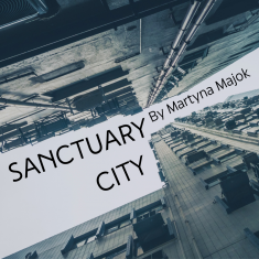 Dilapidated high rise buildings, with a perspective from the ground towards the gray sky. Text on the sky: Sanctuary City by Martyna Majok.